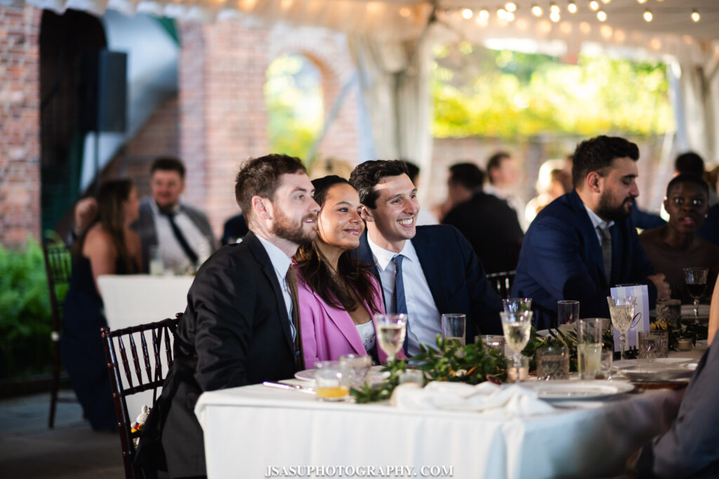 guests taking photo together at a wedding