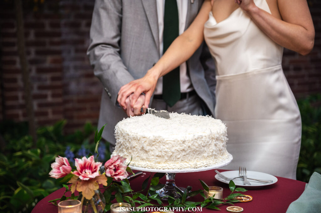 wedding cake being cut