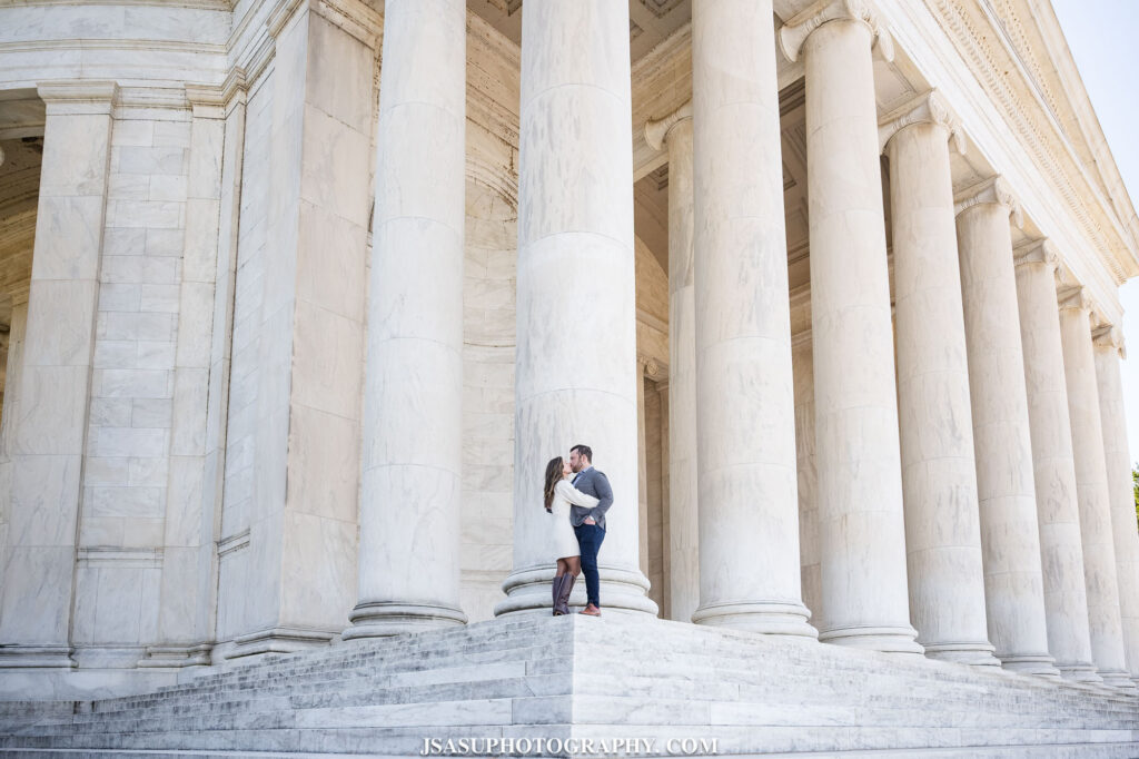 an engagement session in front of the pillars of the lincoln memorial