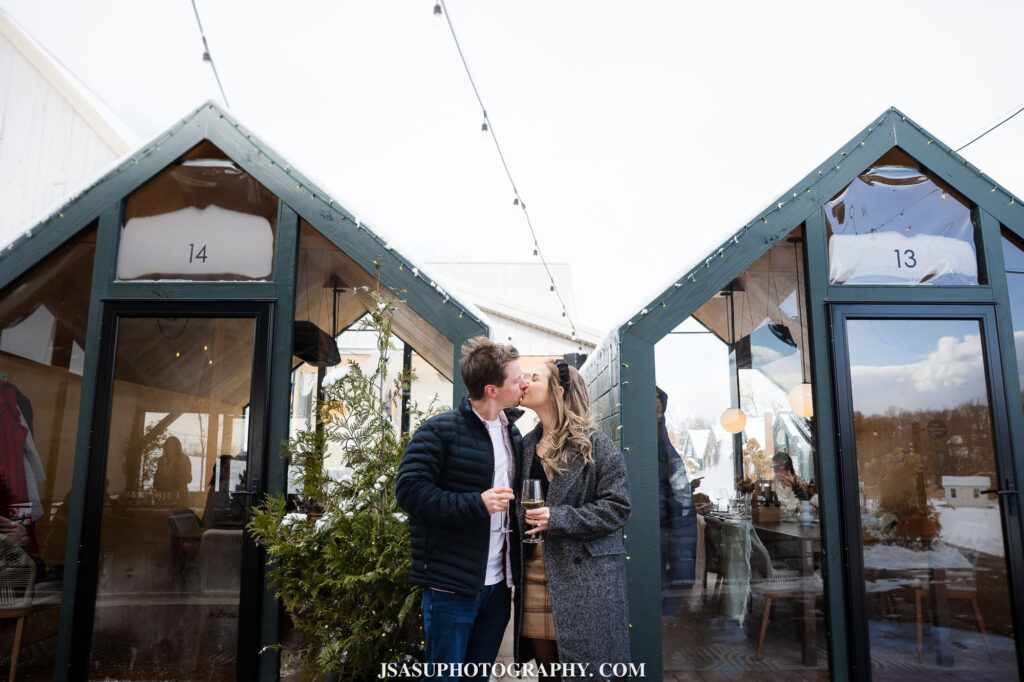 a couple kissing after their engagement at old westminster winery