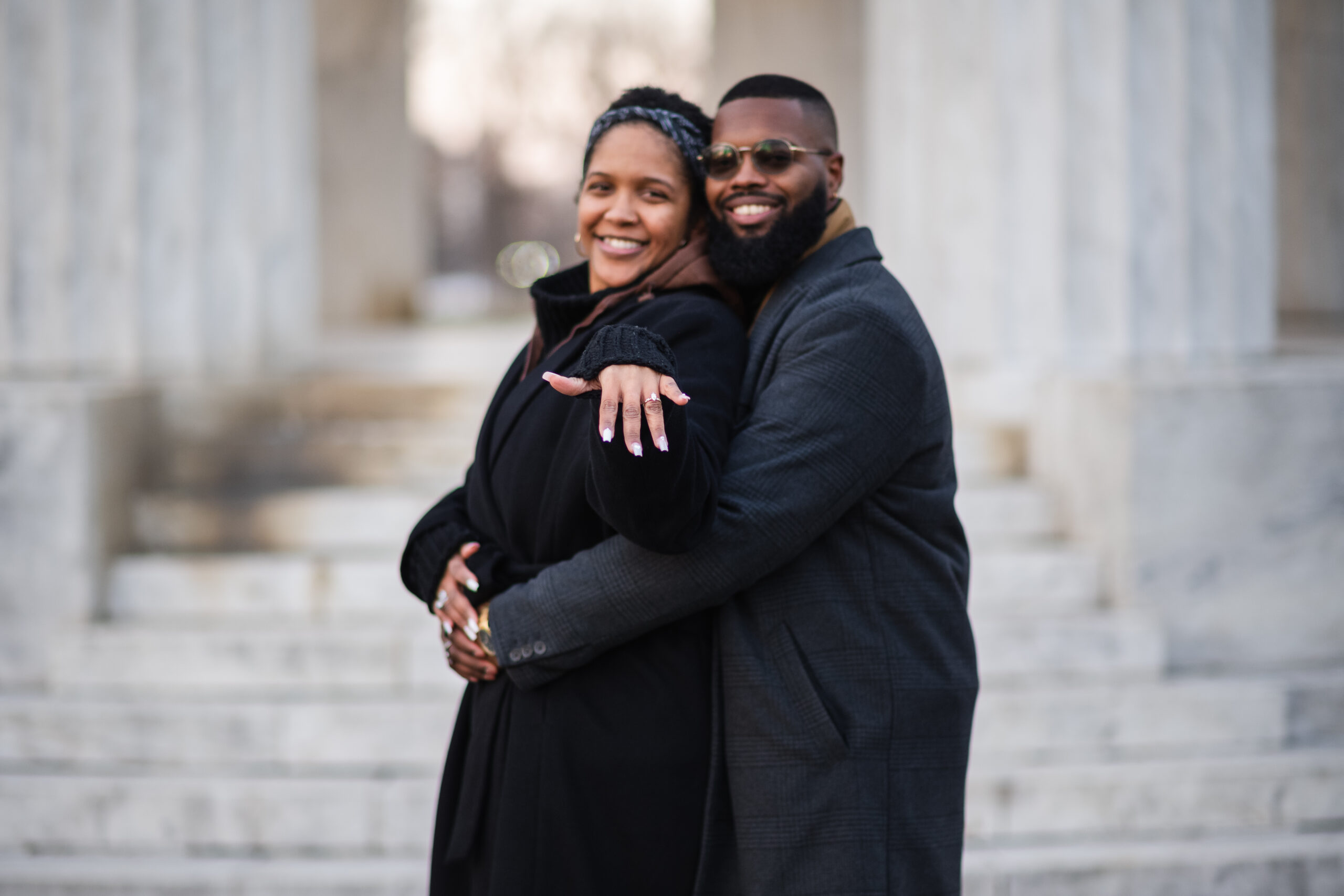 woman showing her engagement ring after surprise proposal in washington, dc