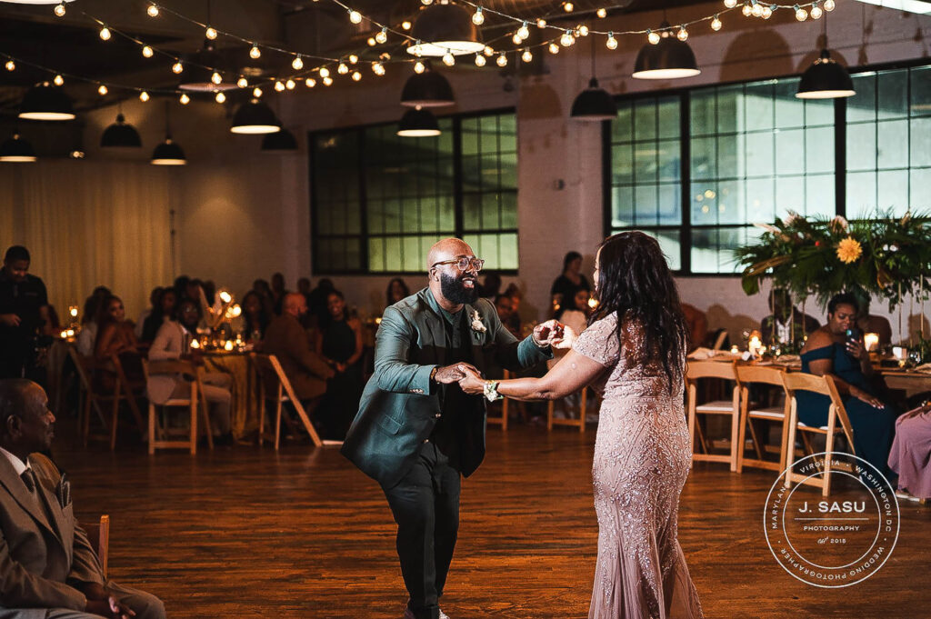 groom and mom share a dance on wedding night