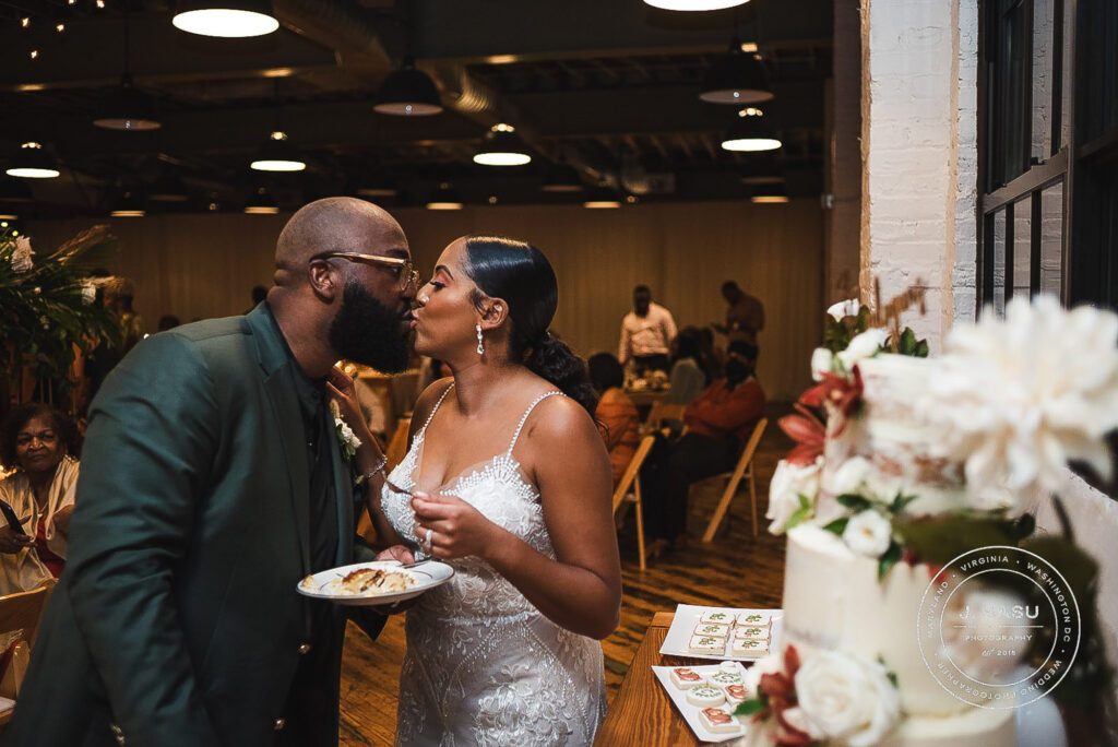 bride and groom cut their wedding cake