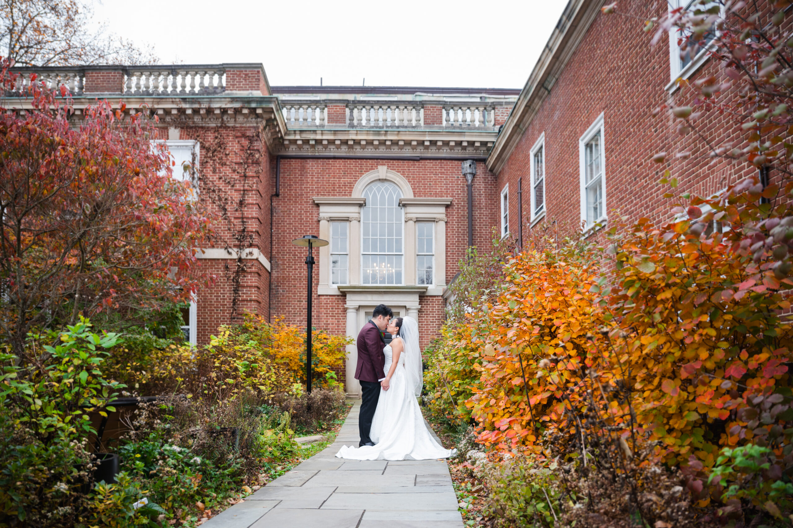 couple posing on wedding day at woodend sanctuary