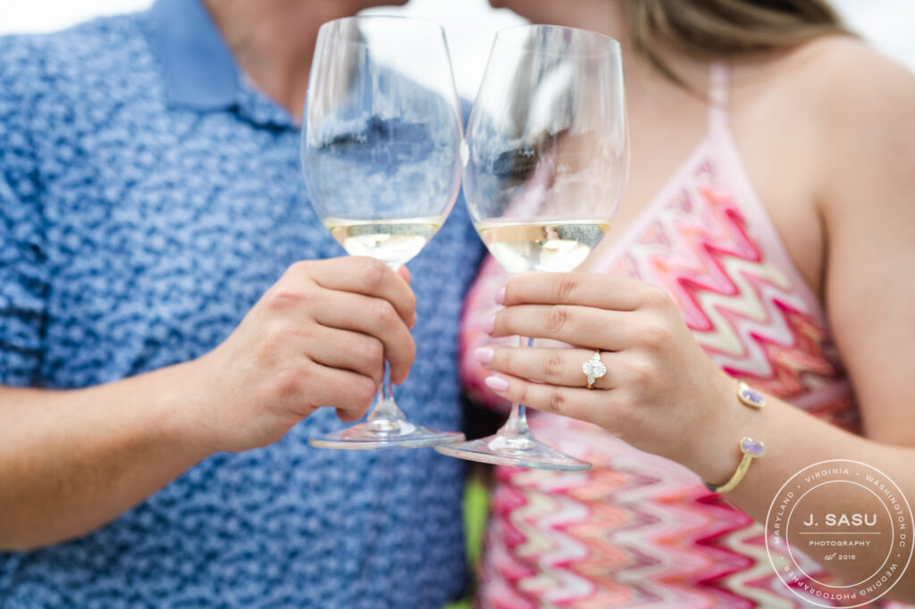 Couple celebrating a surprise proposal at Stone Tower Winery